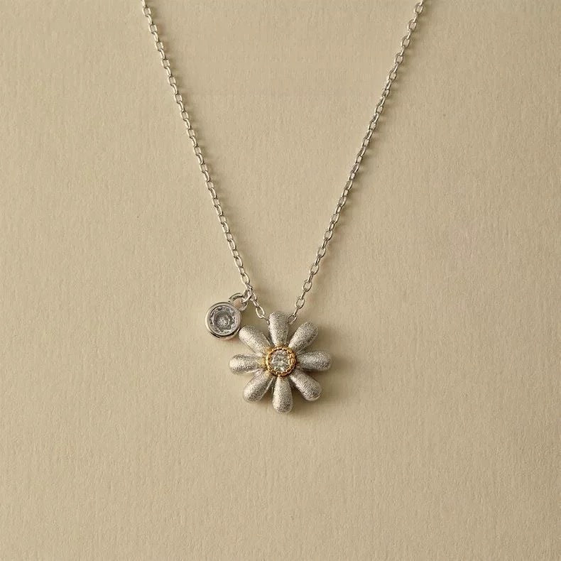 Platinum Plated Brushed Daisy Necklace